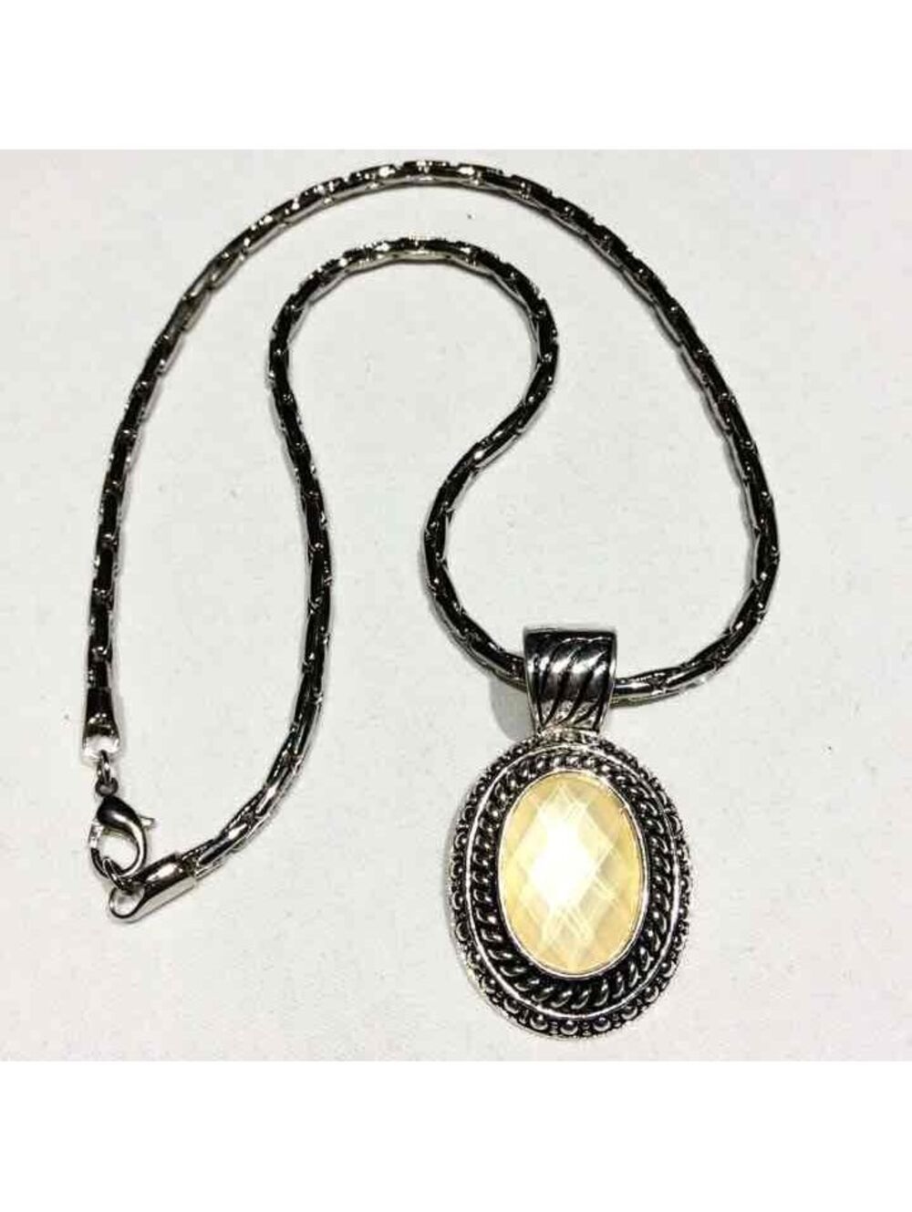 Faceted Oval Silver Pendant Necklace